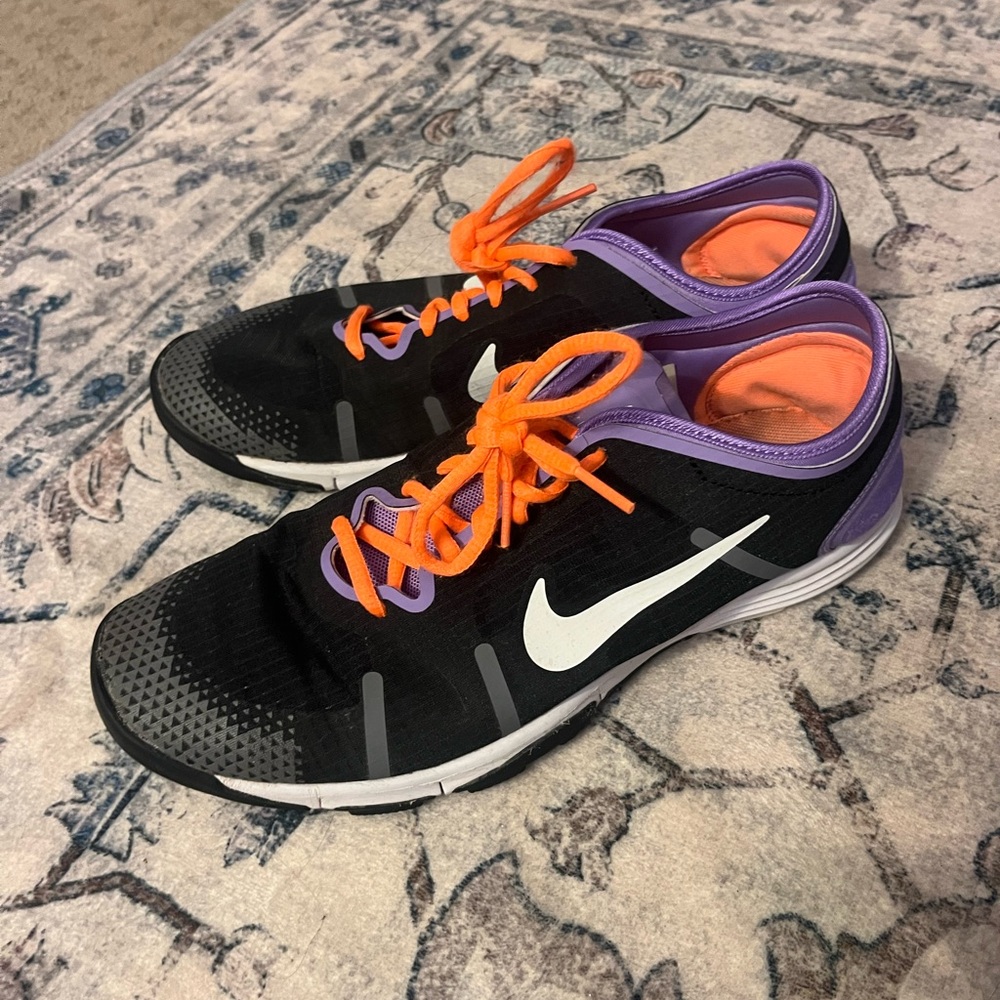 Nike Women's Black and Purple Athletic Shoes with Orange Laces